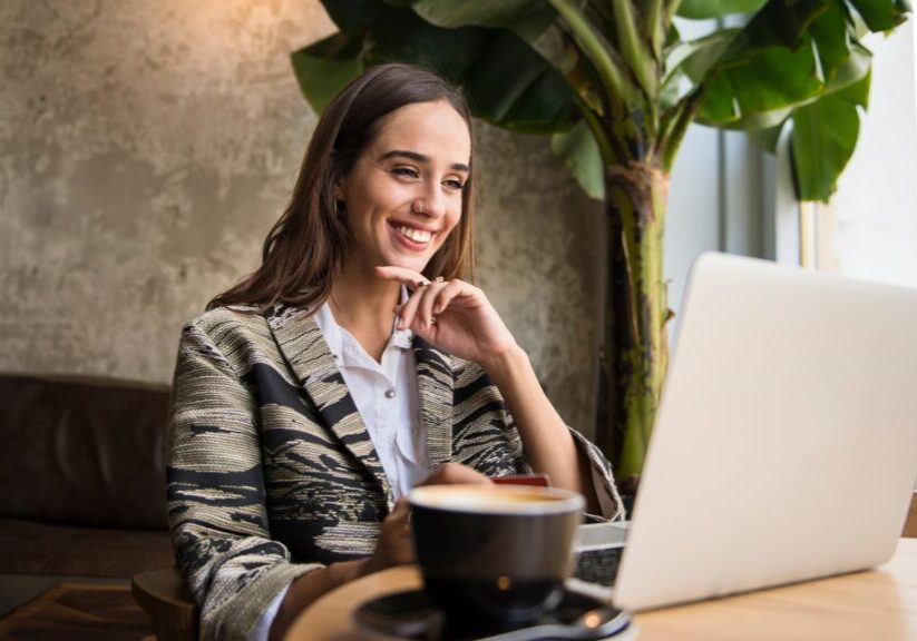 Woman looking at her laptop