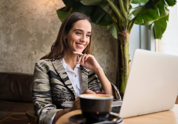 Woman looking at her laptop